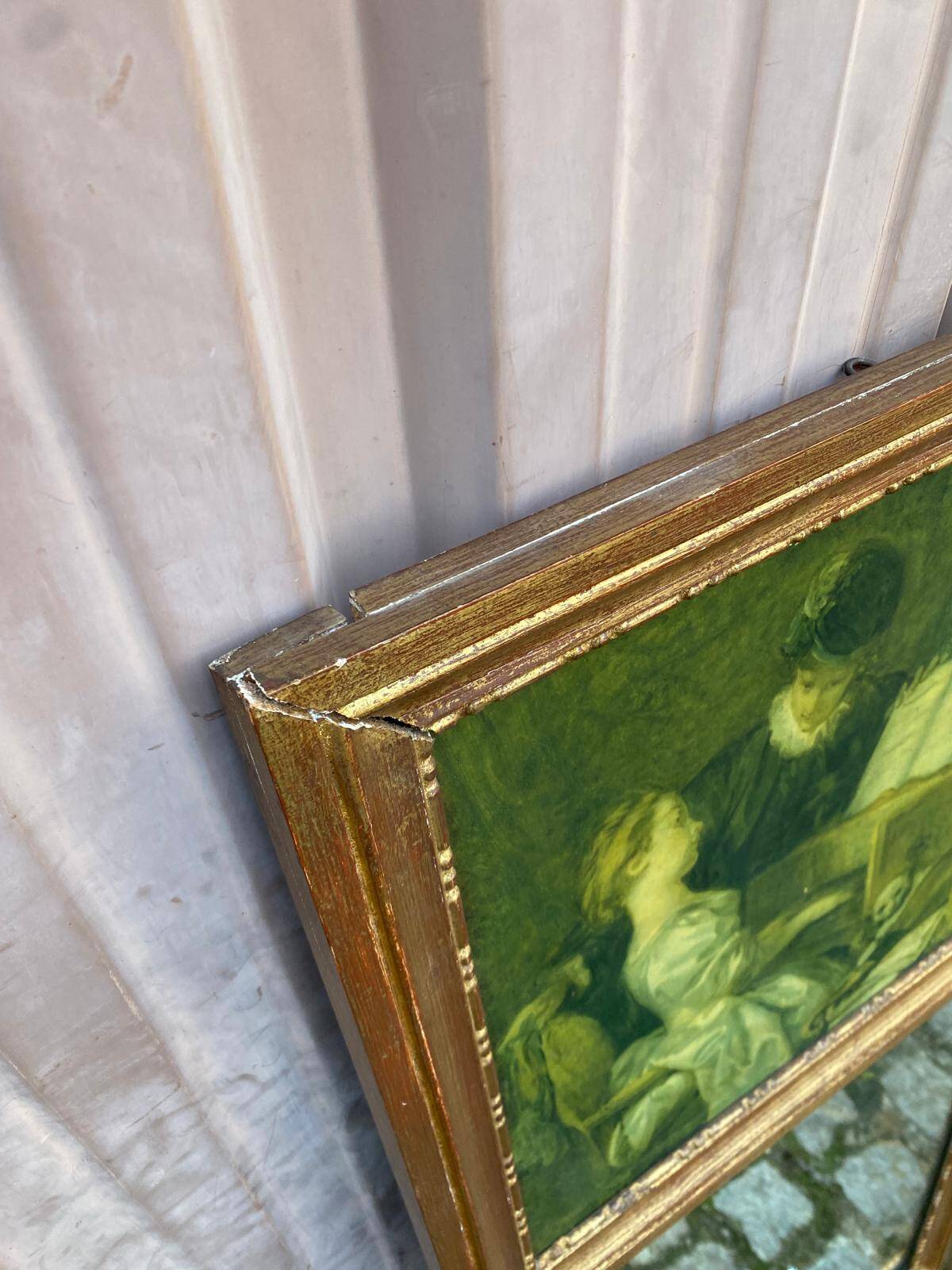 19th-century trumeau with mirror and music lesson canvas.