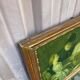 19th-century trumeau with mirror and music lesson canvas.