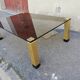 Vintage coffee table smoked glass and golden feet