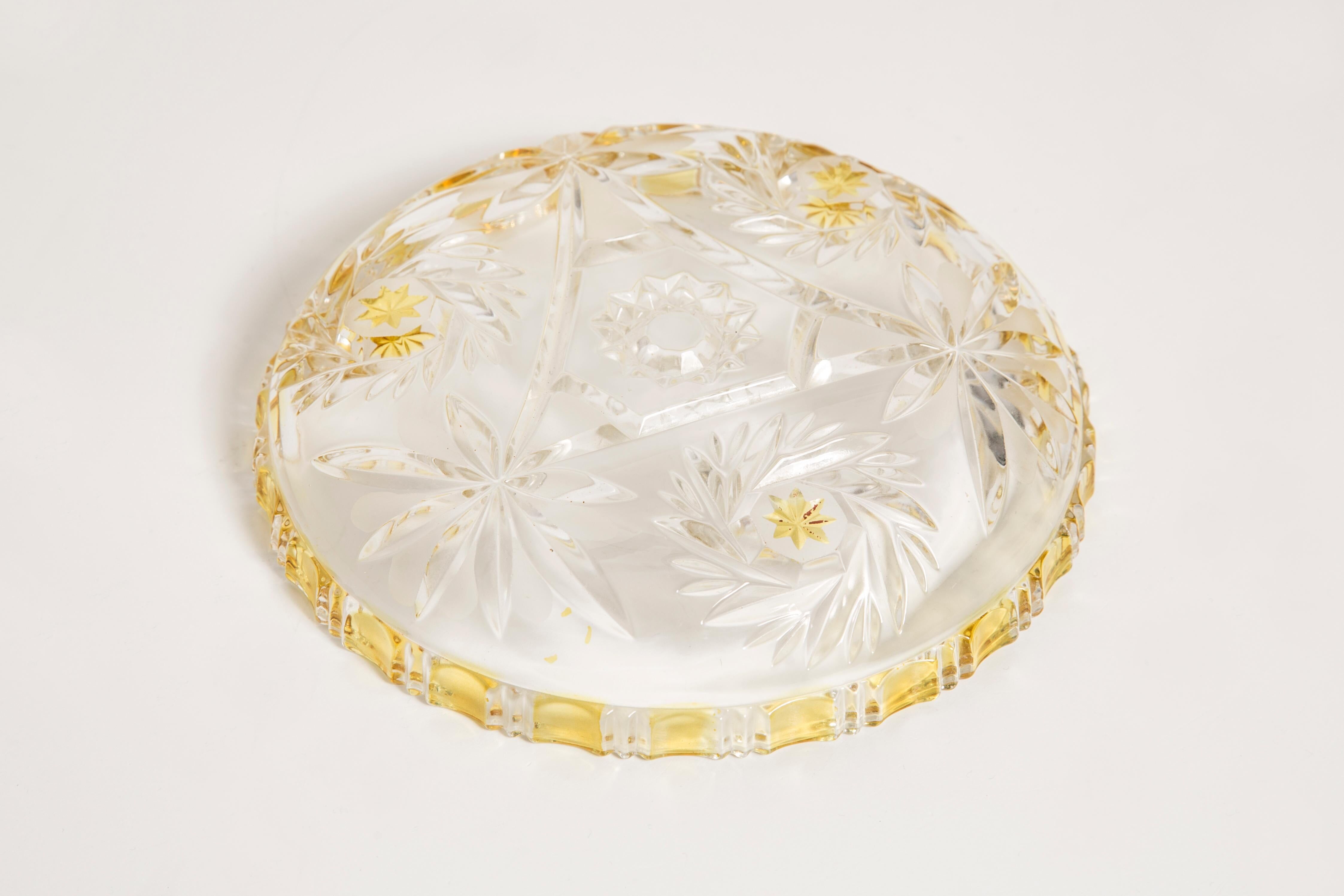 Decorative plate in transparent and vintage yellow glass, Italy, 1960s.