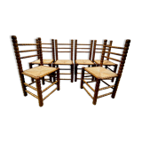Brutalist chairs mulched in turned wood from the 60s
