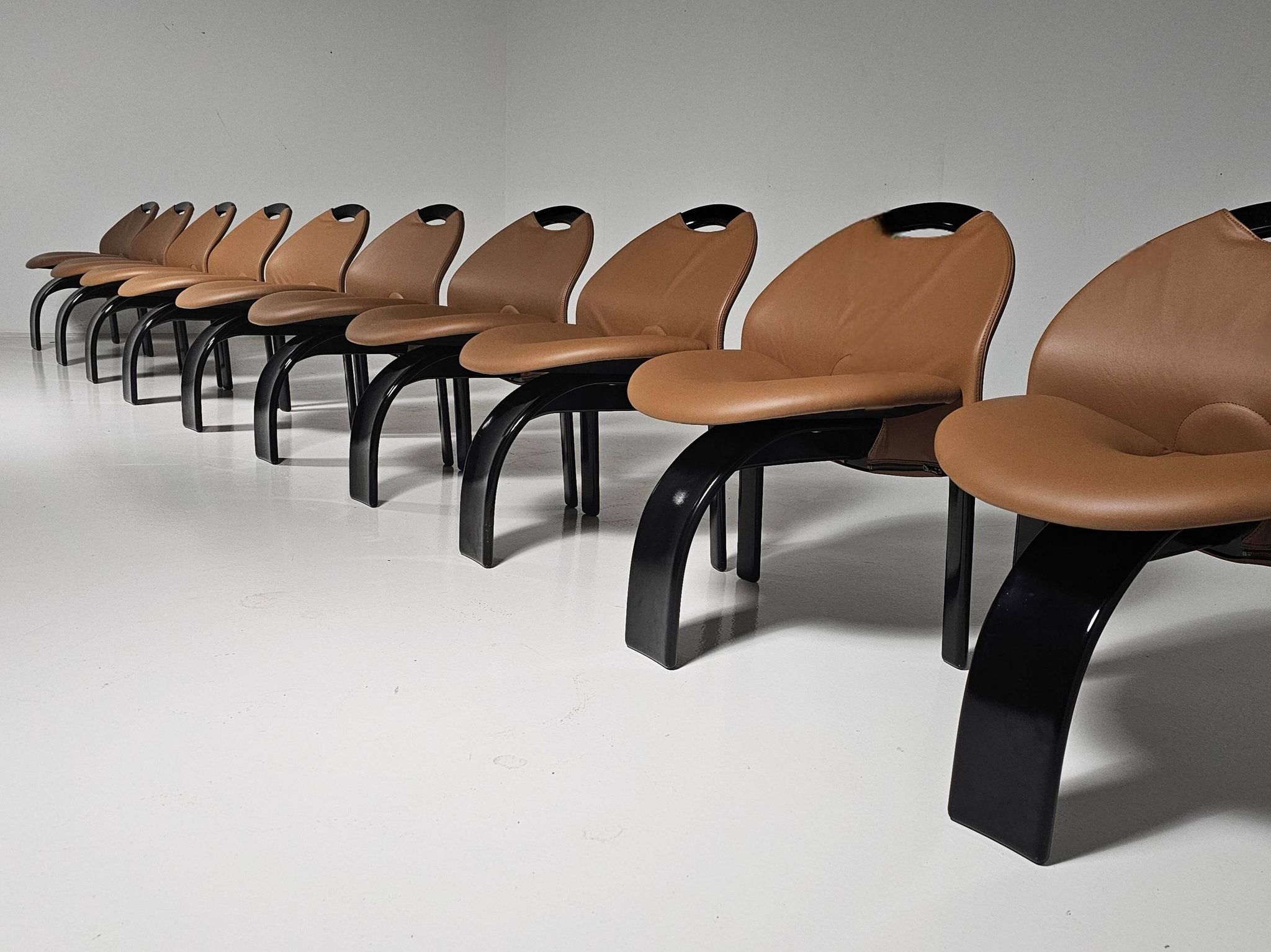 Set of 10 "Sail" dining chairs by Giovanni Offredi for Saporiti, 1973.