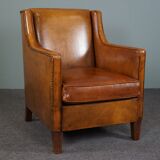 Modern charming armchair in sheepskin