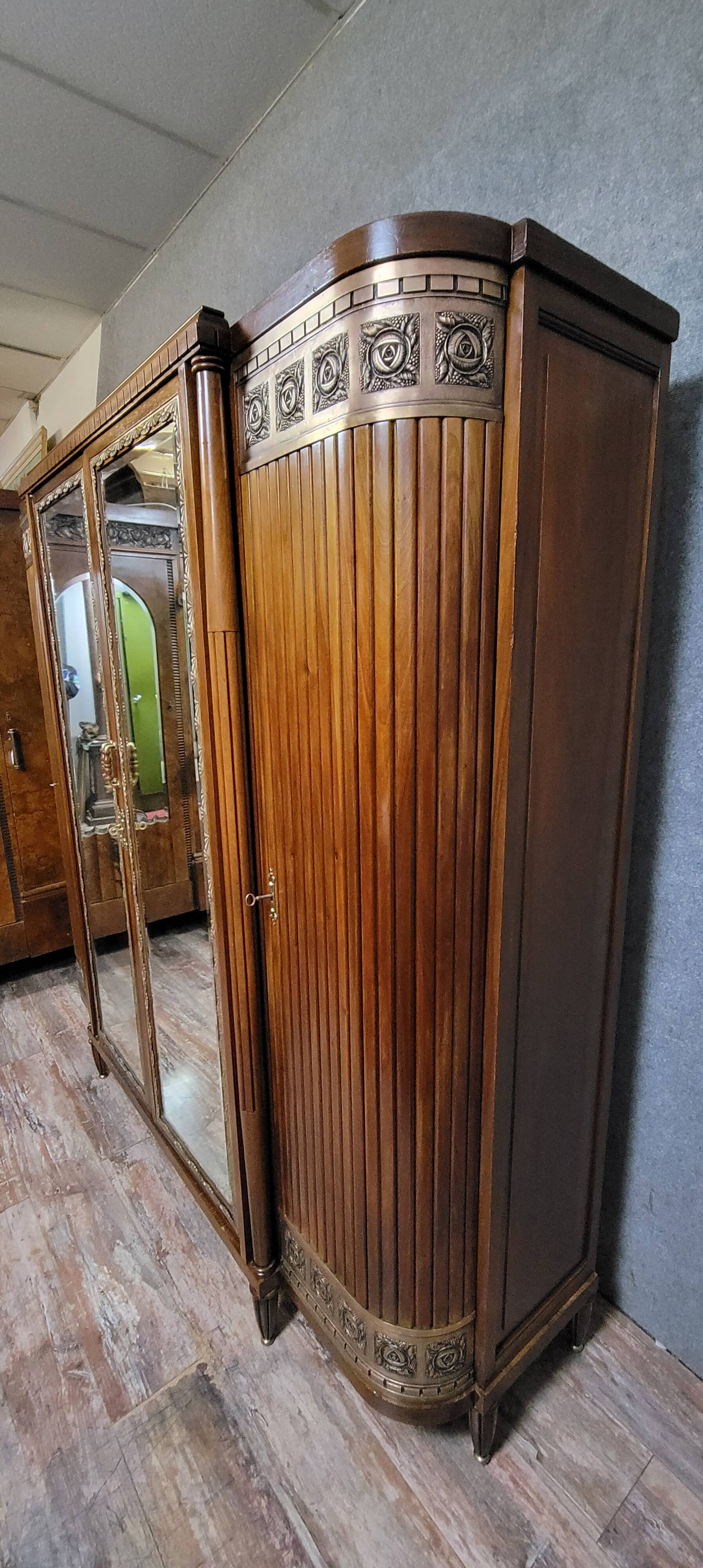 Large Art Deco bookcase wardrobe in mahogany and bronze.