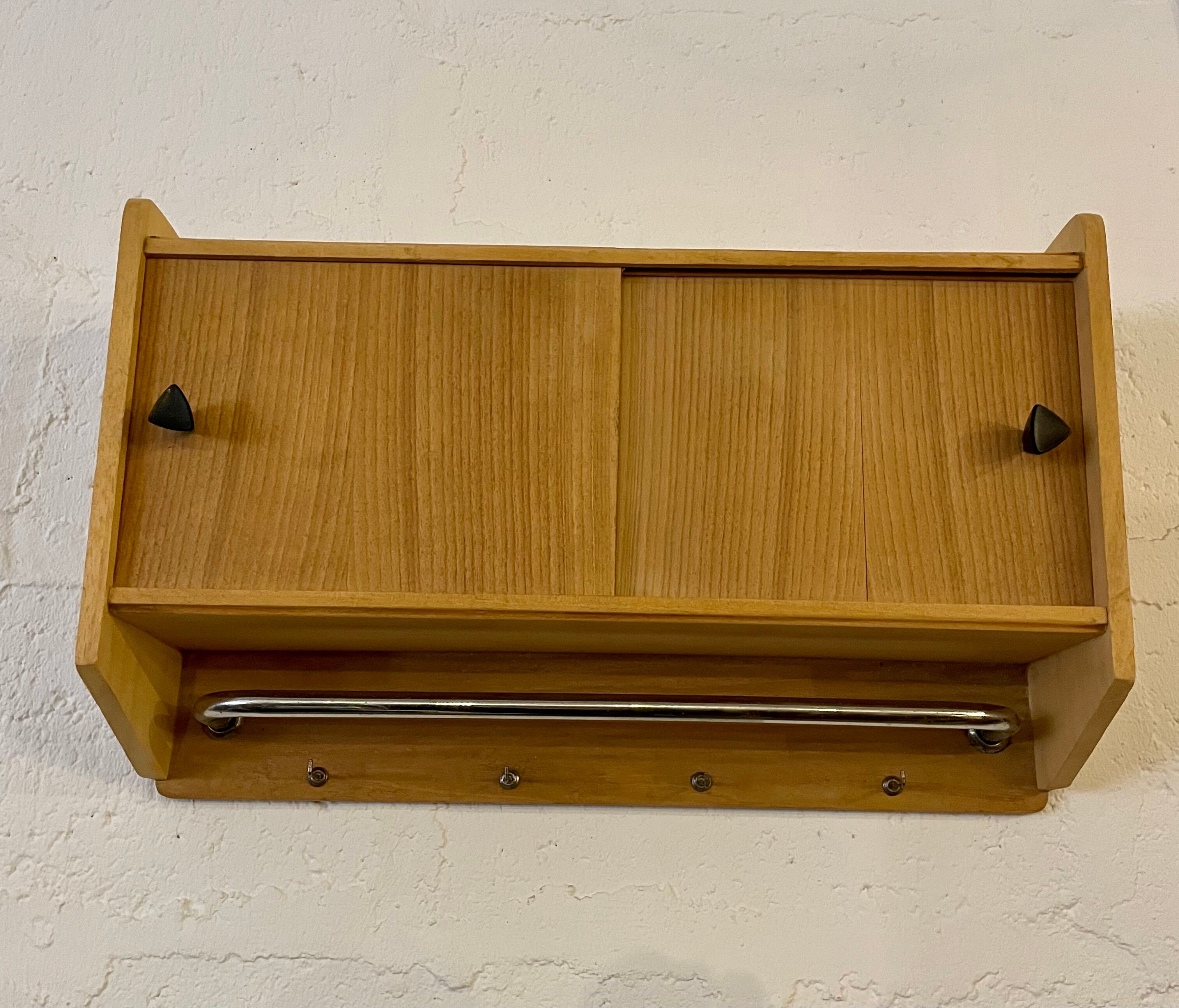 Hanging cabinet in vintage metal wood