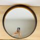 Round mirror Syla 710 amber rim, vintage 70's