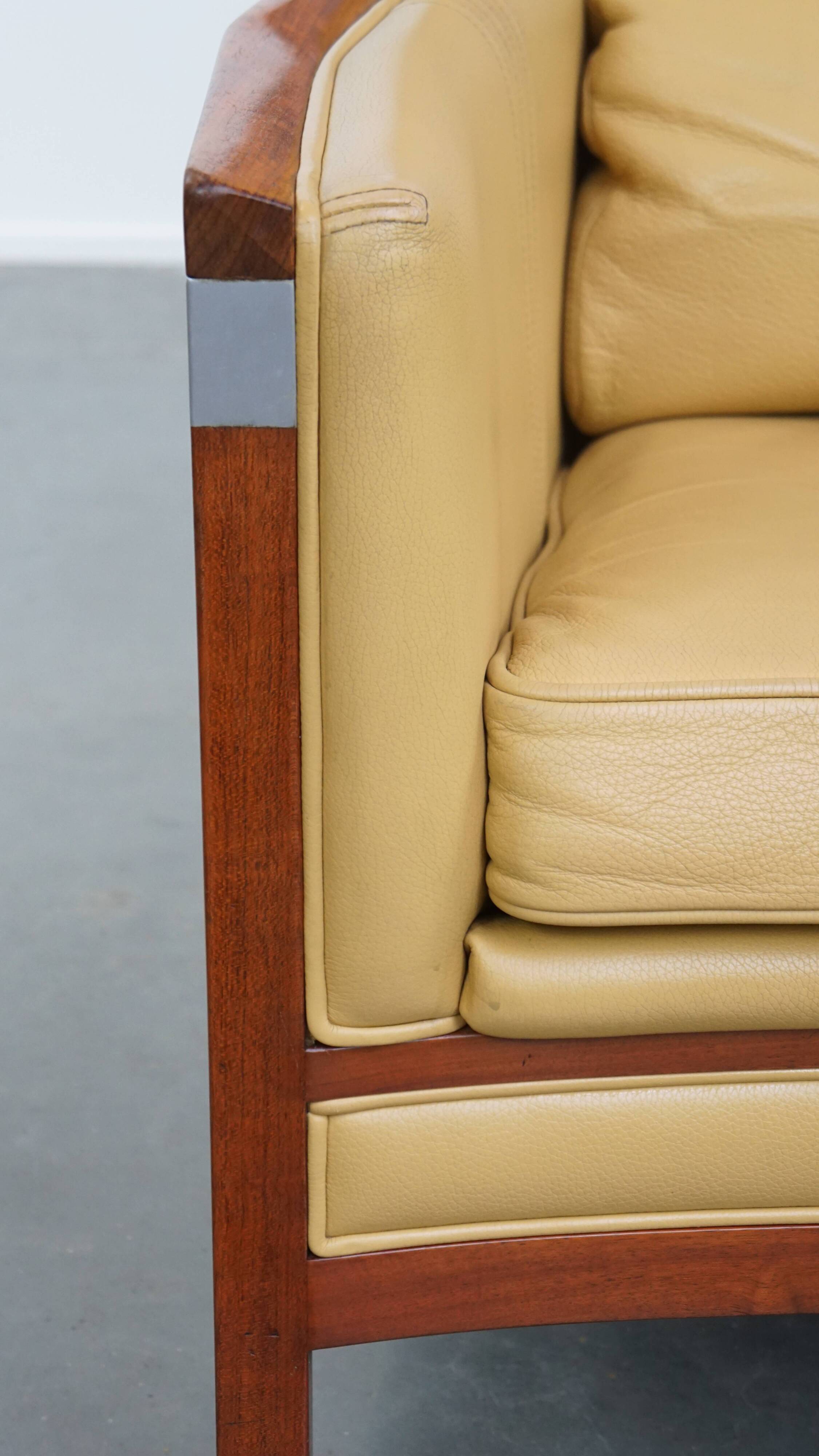 Art Deco armchair in yellow leather with high back