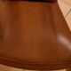 Pair of Art Deco armchairs in curved wood and brown leather – 1930s