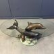Bronze dolphin coffee table signed C Caudion, 1960s