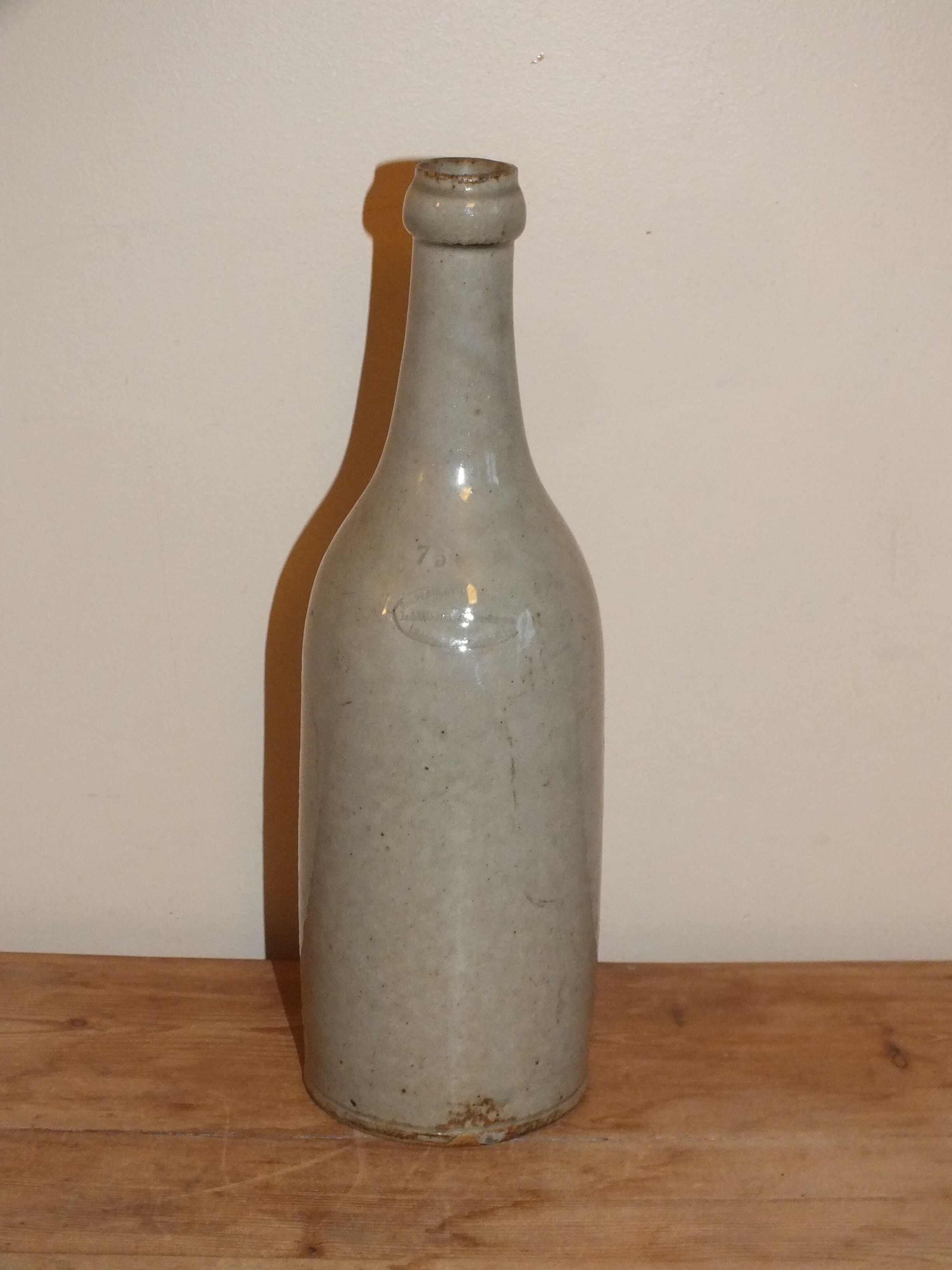 Old bottle in glazed clay of Saône et Loire