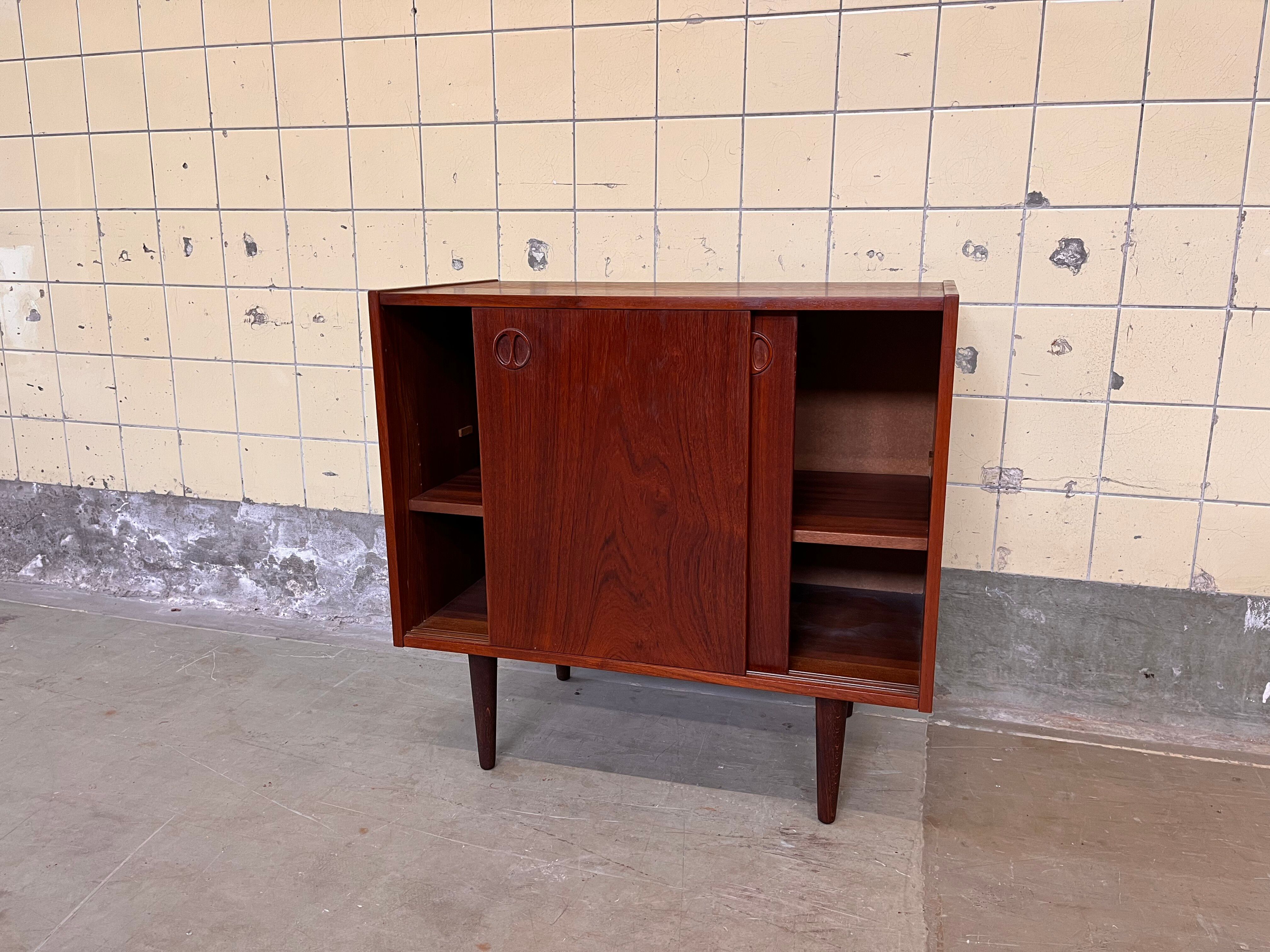 Vintage Danish cabinet with sliding doors