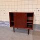 Vintage Danish cabinet with sliding doors