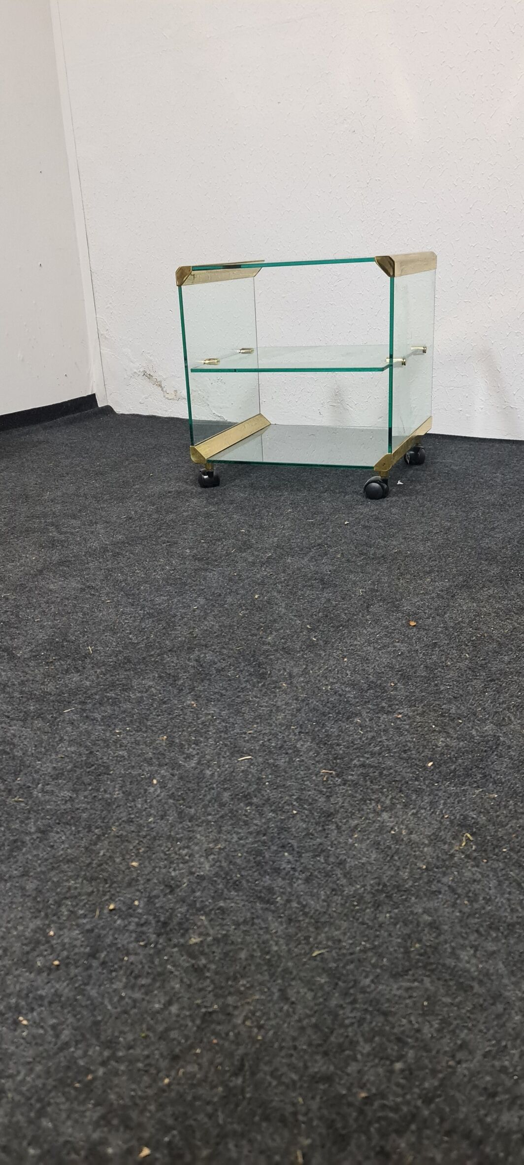 Vintage glass sidetable on wheels