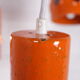 6 Orange enamelled metal suspensions, 1960s