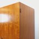 Vintage modernist wardrobe in teak and metal from the 1960s.