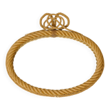 Large oval mirror in rope with pediment, 64cm x 56.5cm.