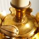 "Pique candle" double fire floor lamp in gilded bronze