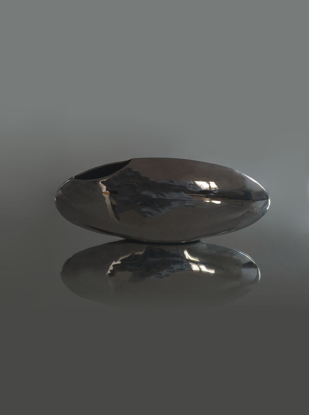 Minimalist oval steel vase