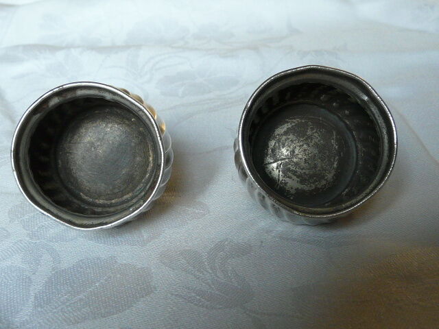 Pair of silver pepper shaker punch minerve
