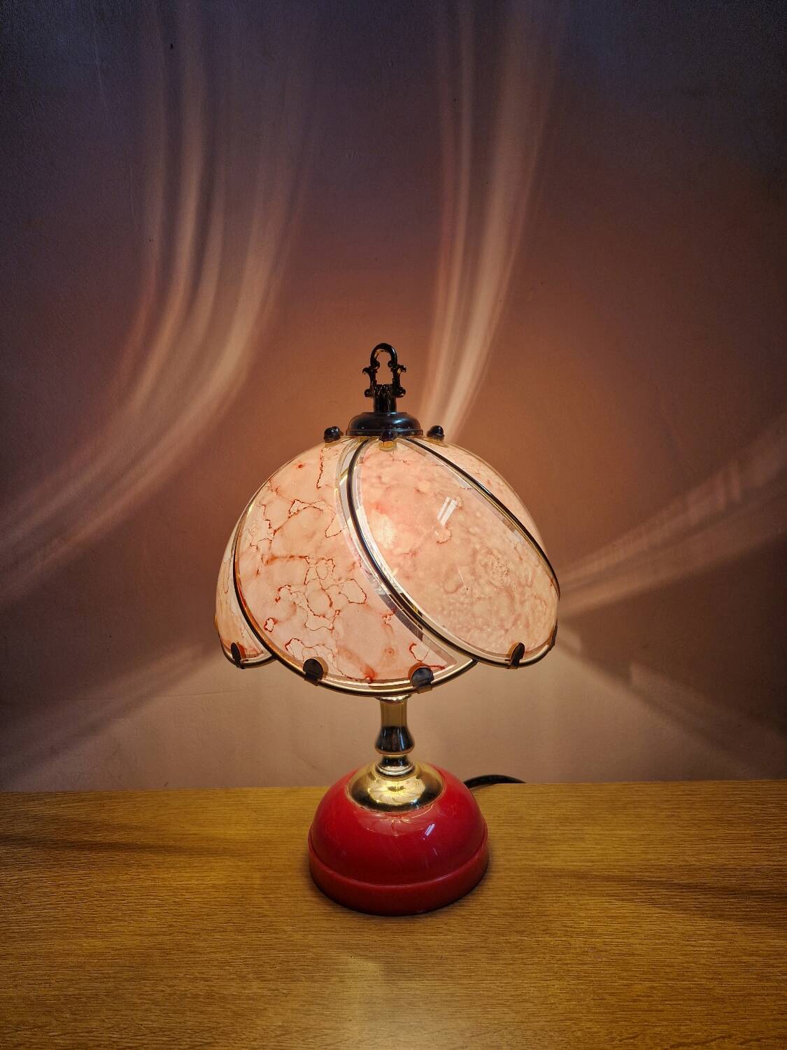 Vintage pink glass globe lamp with brass details and pink base