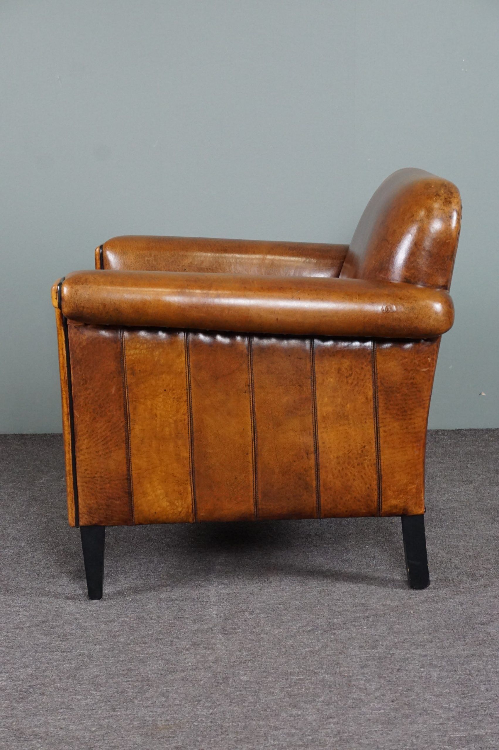 Schapenleren armchair and studio lounge stool