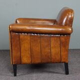 Schapenleren armchair and studio lounge stool