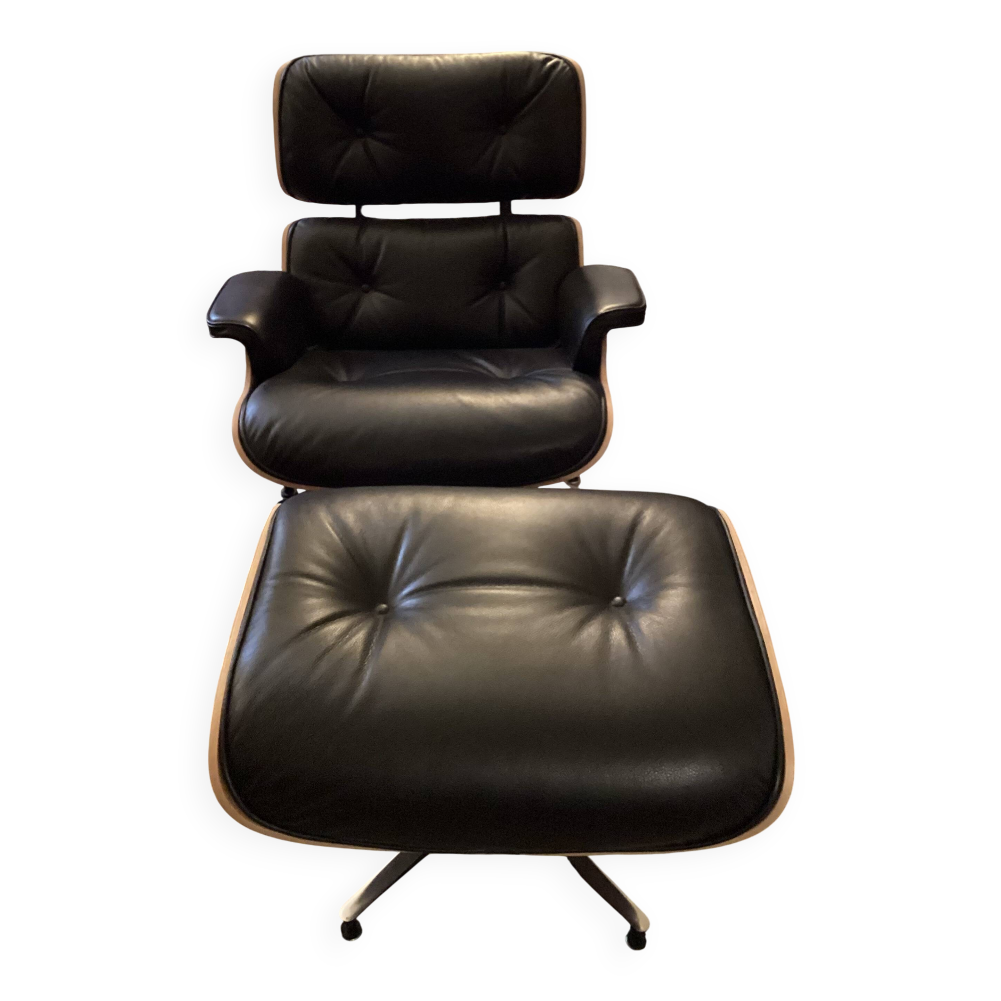 Chair and ottoman by Charles Eames, Herman Miller edition.