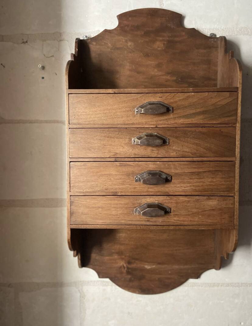 Antique piece of furniture with walnut drawers to hang
