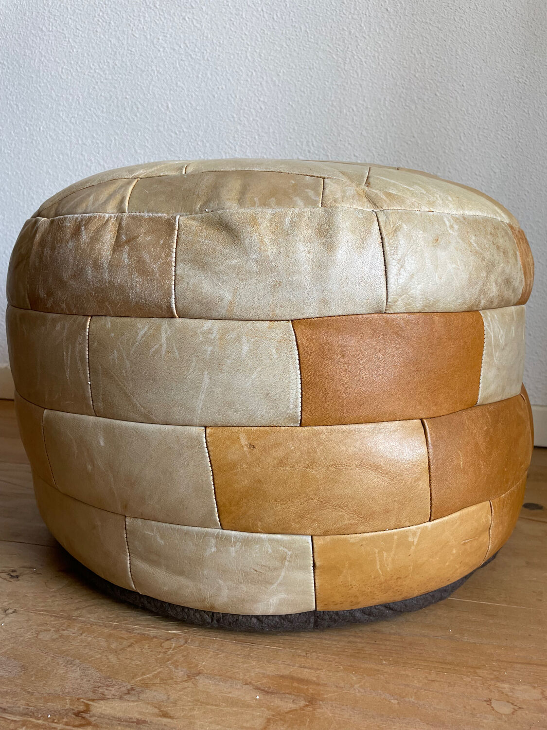 Brown and beige patchwork leather pouf from sede
