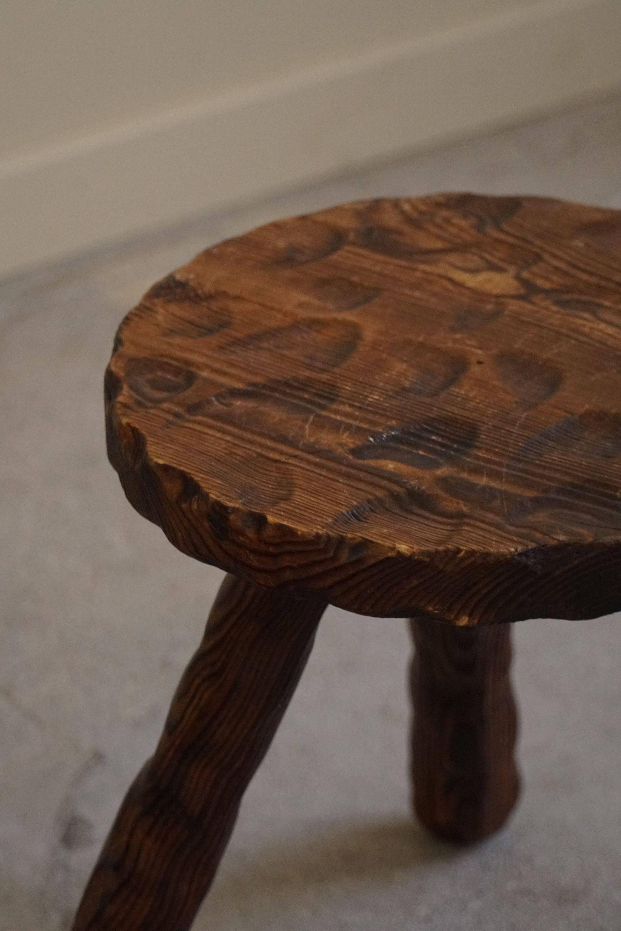 A pair of Wabi Sabi stools carved from pine, mid-century modern Swedish style, 1960s.