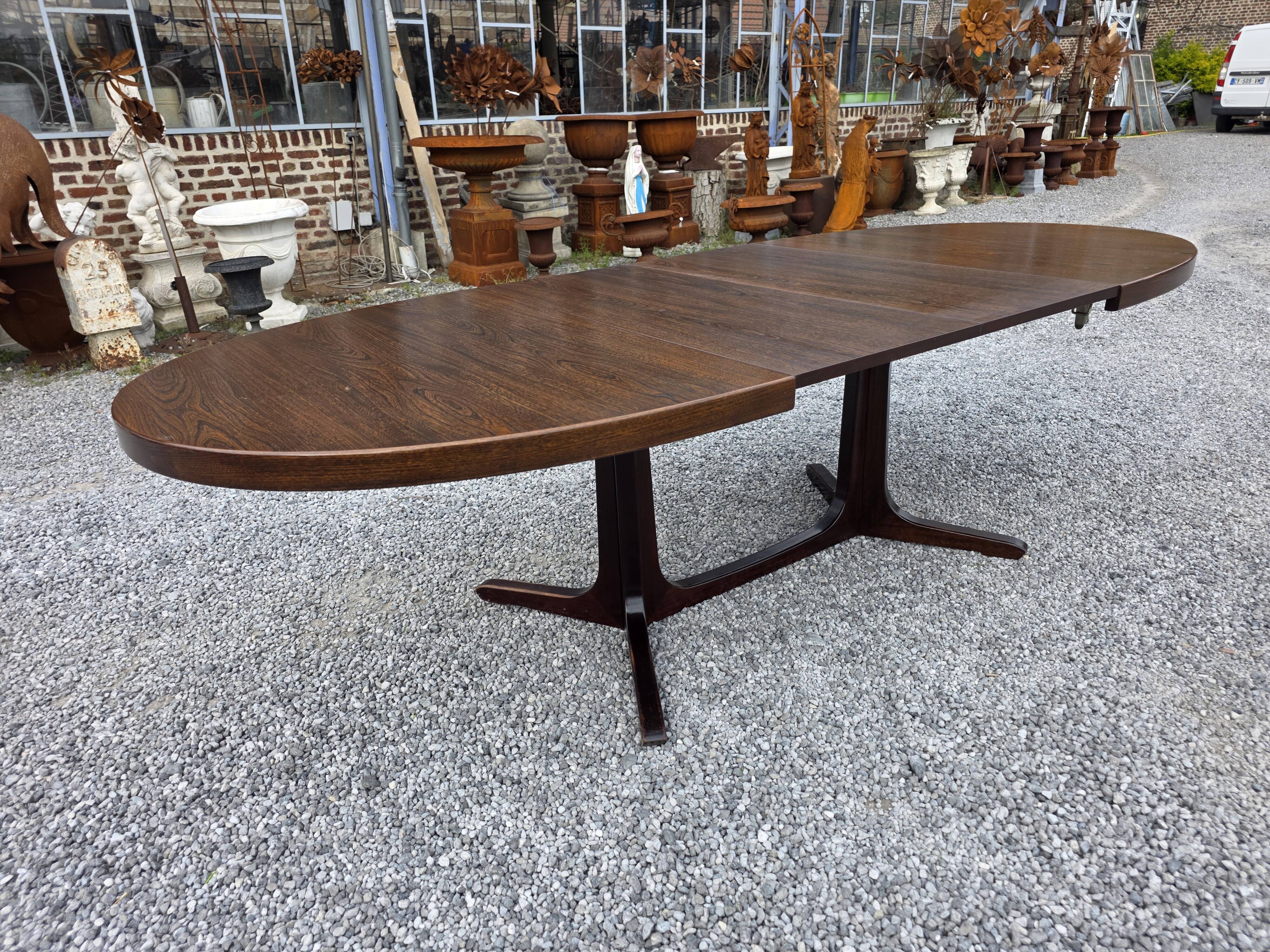 Extensible Baumann table in oak from the 1960s.