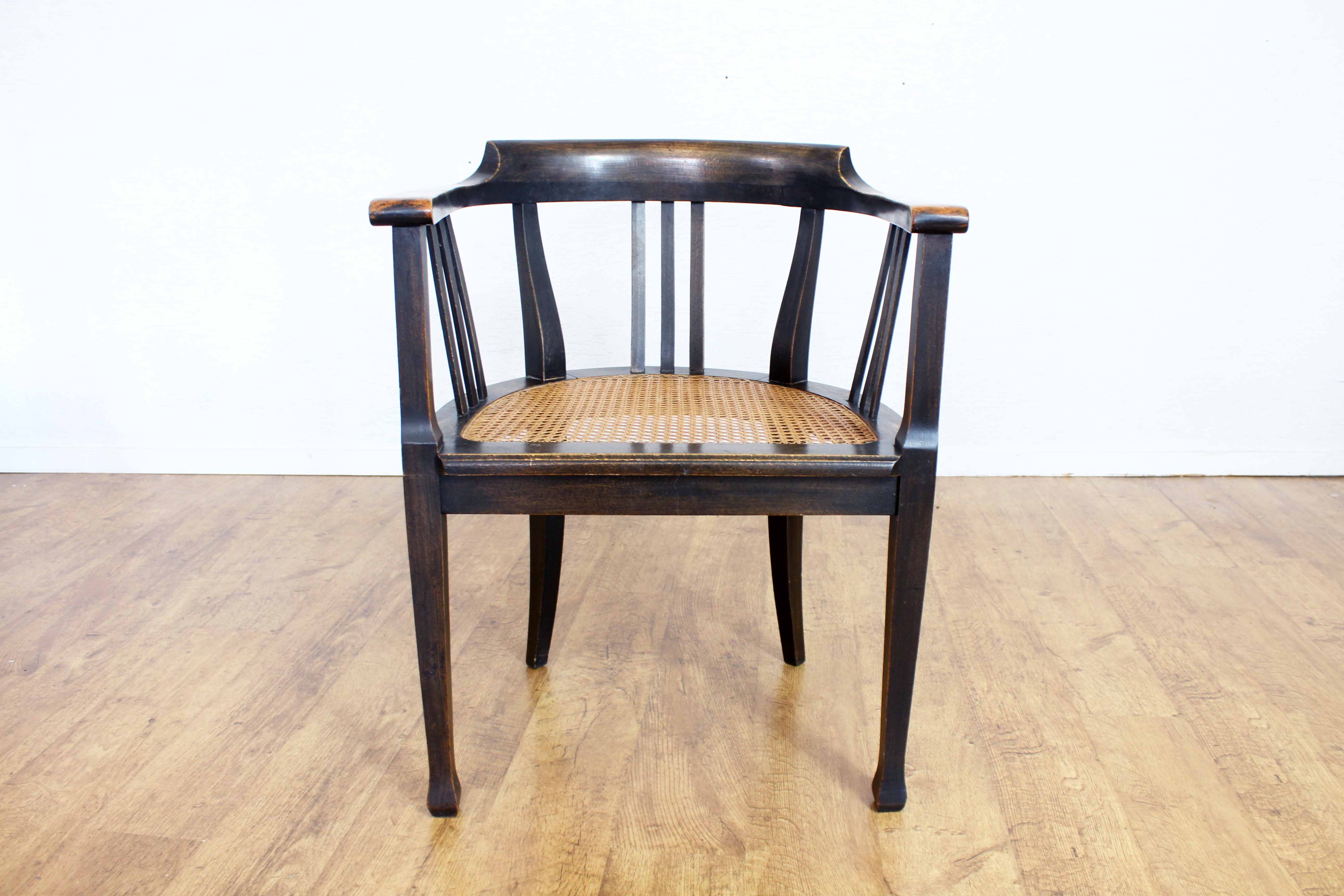 Old chair made of solid wood and caning