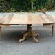 Round dining table with central leg extendable in solid oak from the 18th century 210