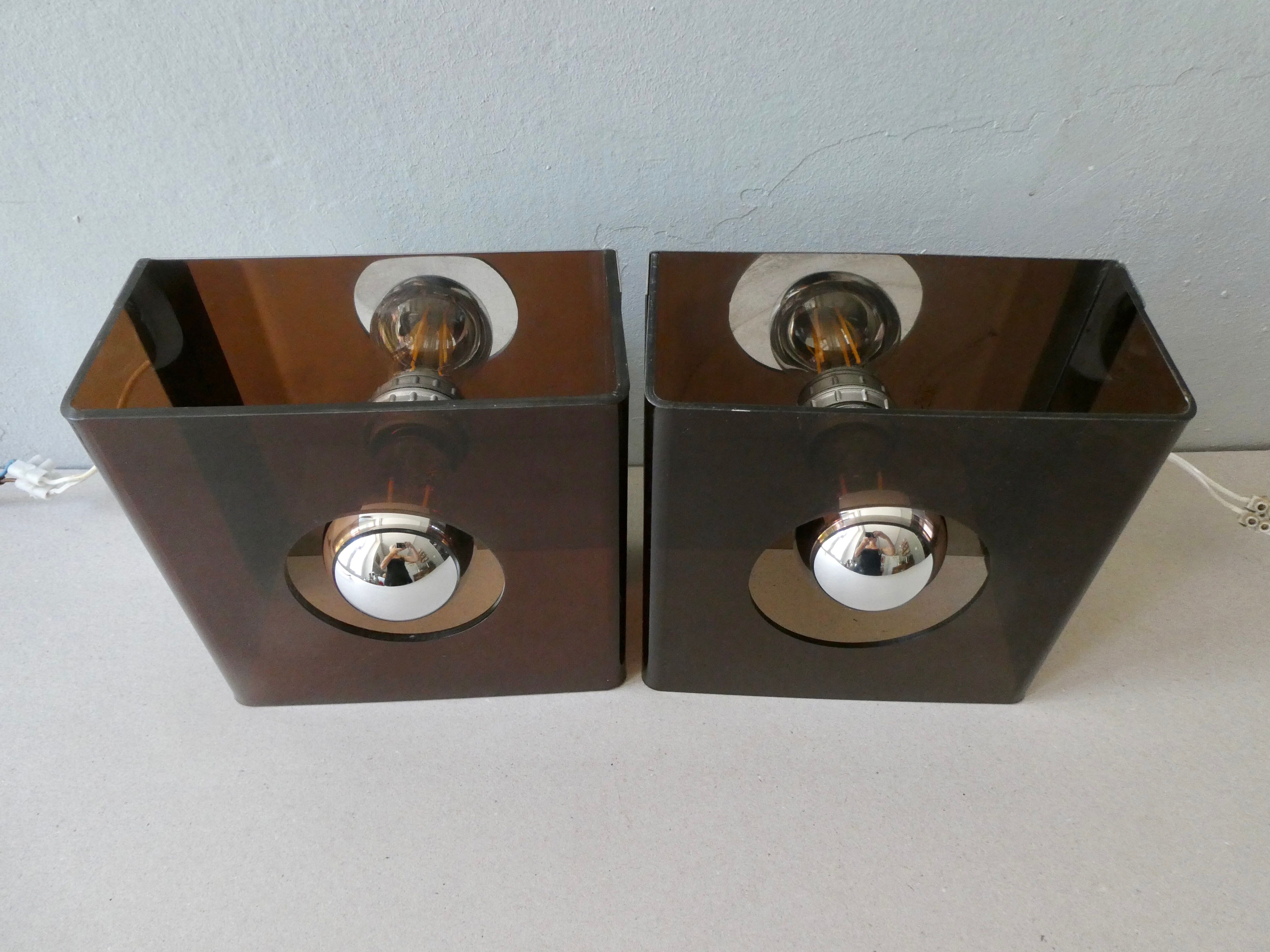 Pair of sconces in smoked Plexiglas by Jocelyne Trocmé model "disco"