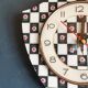 Vintage silent asymmetrical wall pendulum clock "Black and white checkered flowers"