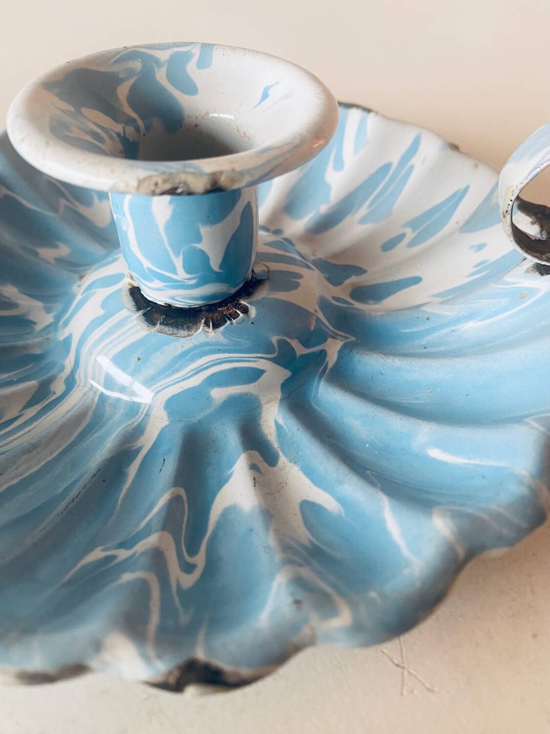 Old blue enameled metal candle holder