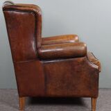 Fauteuil à oreilles en cuir de mouton