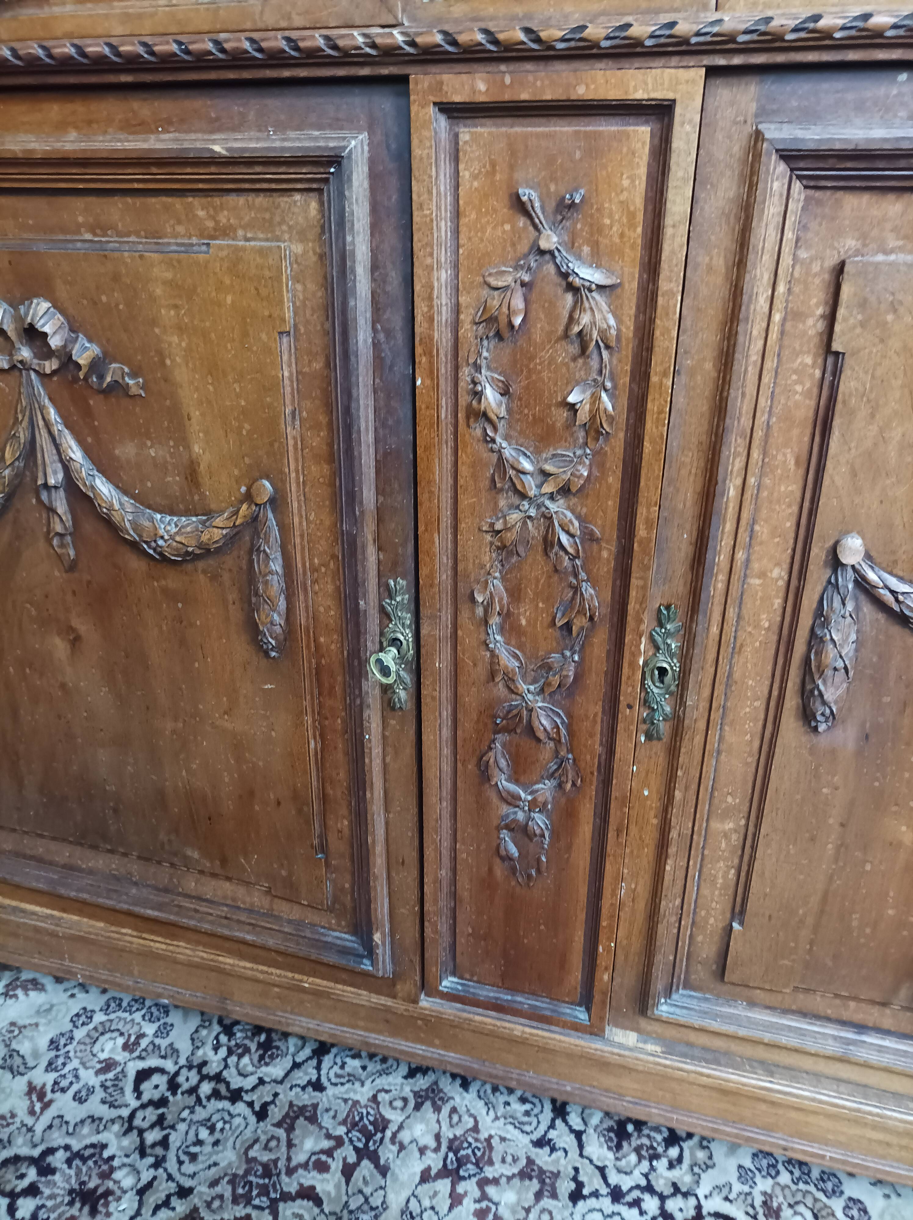 Louis XVI two-body sideboard stamped in walnut
