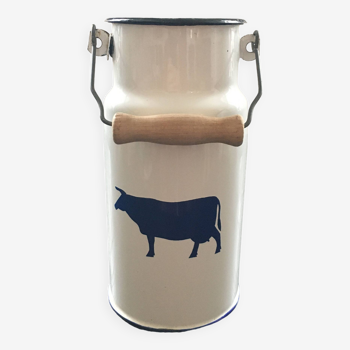 Metal milk jug with cow decor