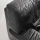 Black leather two-seater sofa. Roche Bobois edition. France, 1980s.