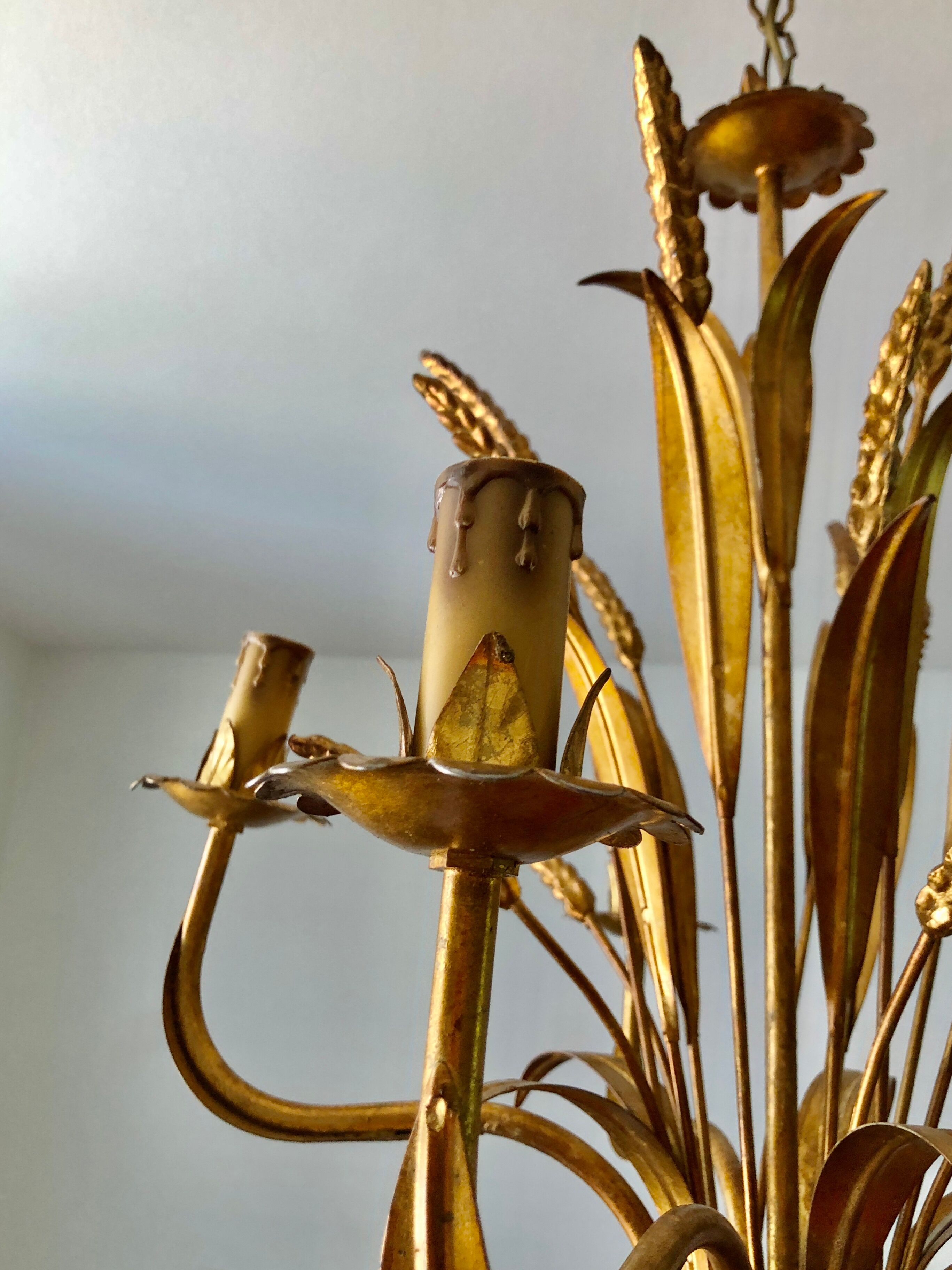Golden suspension 5 fires with a bouquet of ears of wheat