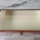 Mid-century drawer chest in mahogany, brass and glass.