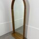 Miroir à tablette cerclage bois, forme ogive, années 60