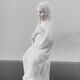 Vintage white plaster statuette of the Virgin Mary.