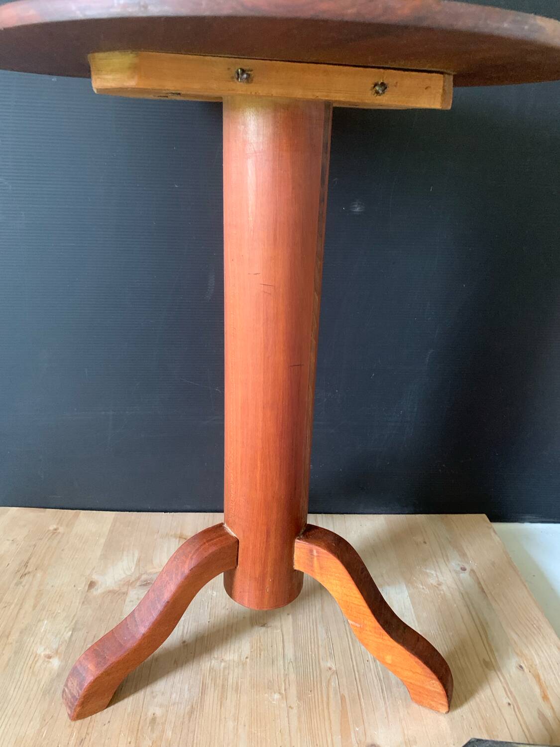 Wooden pedestal table
