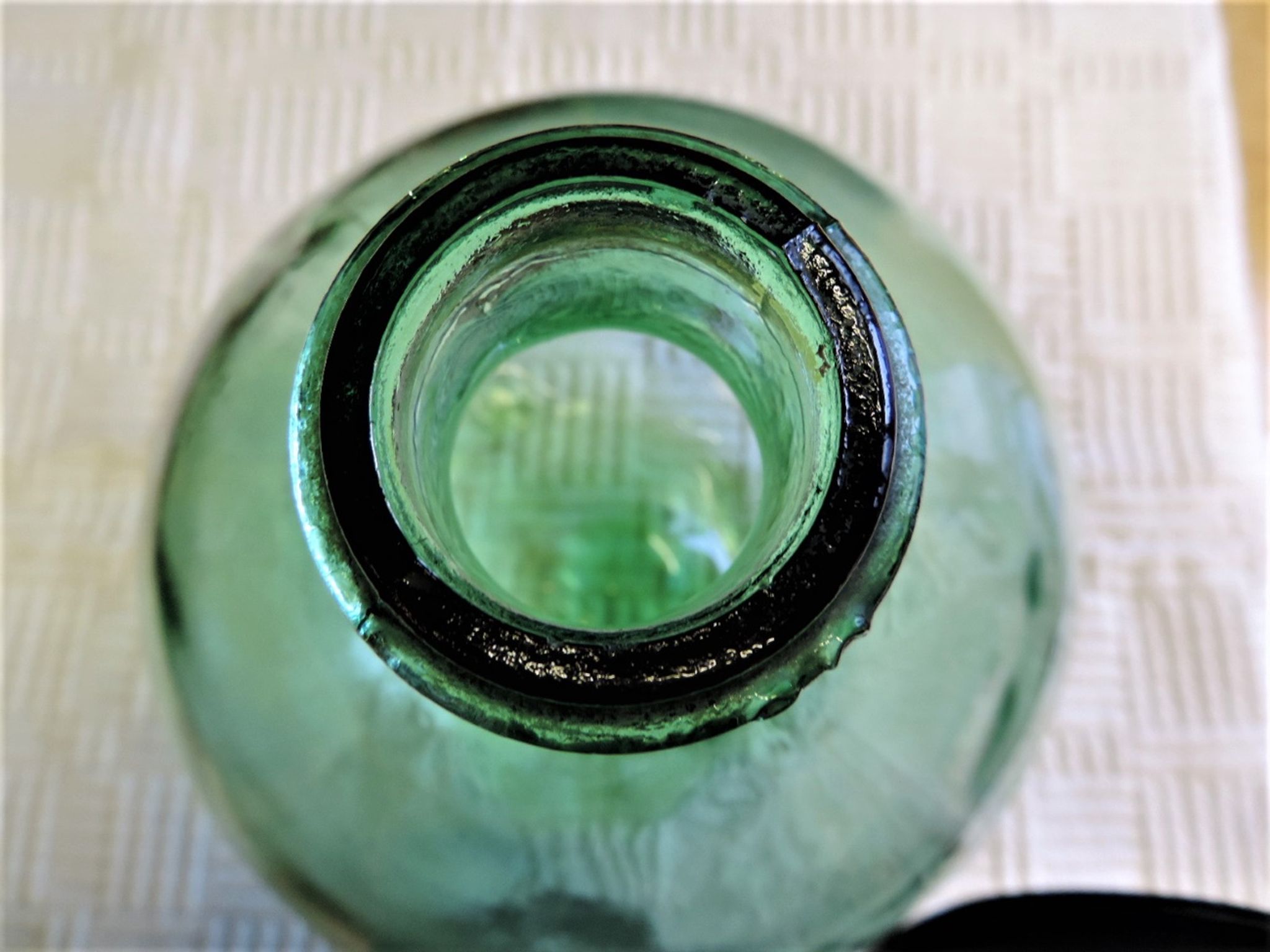 Dame-Jeanne or old glass bottle