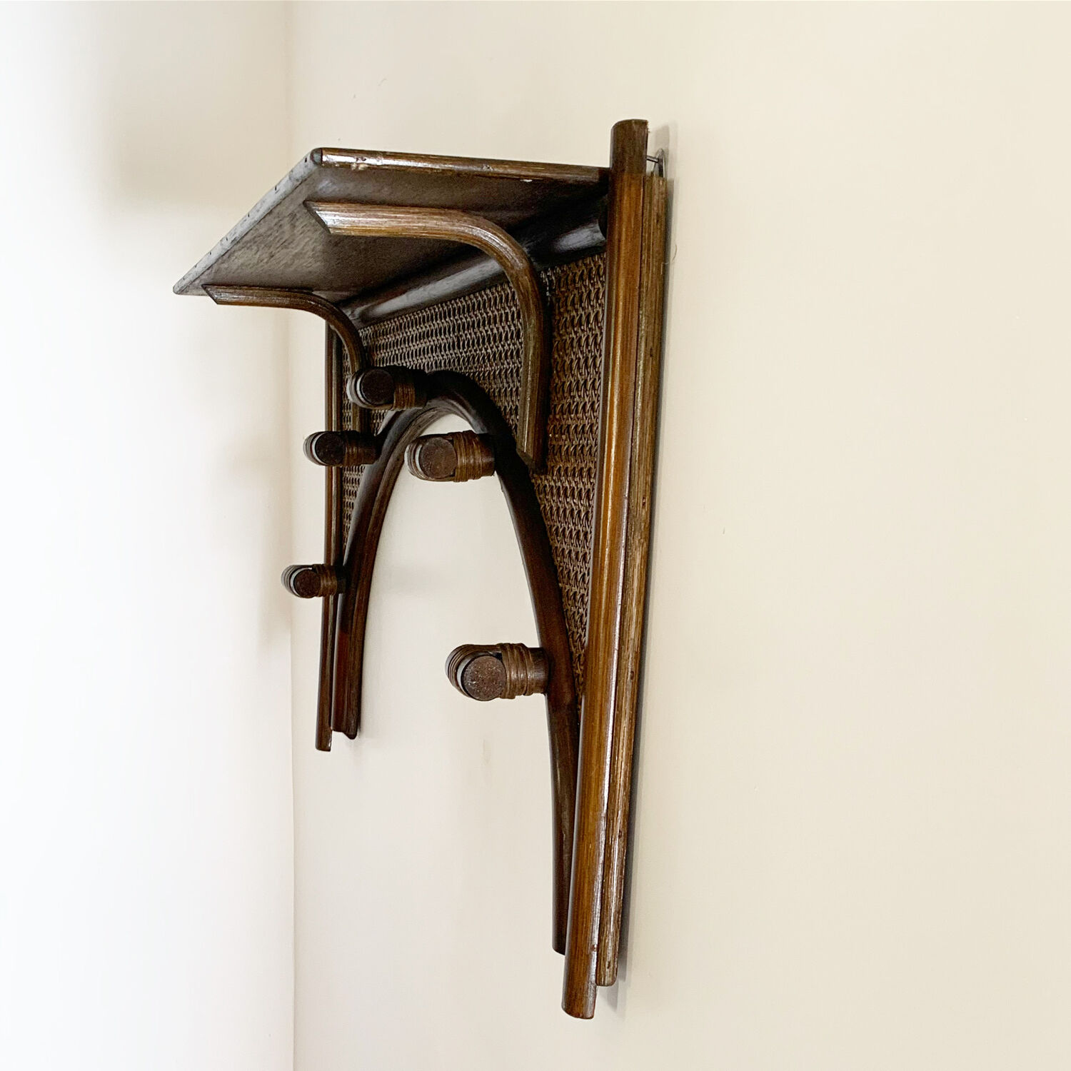 Vintage rattan and cane wall coat rack