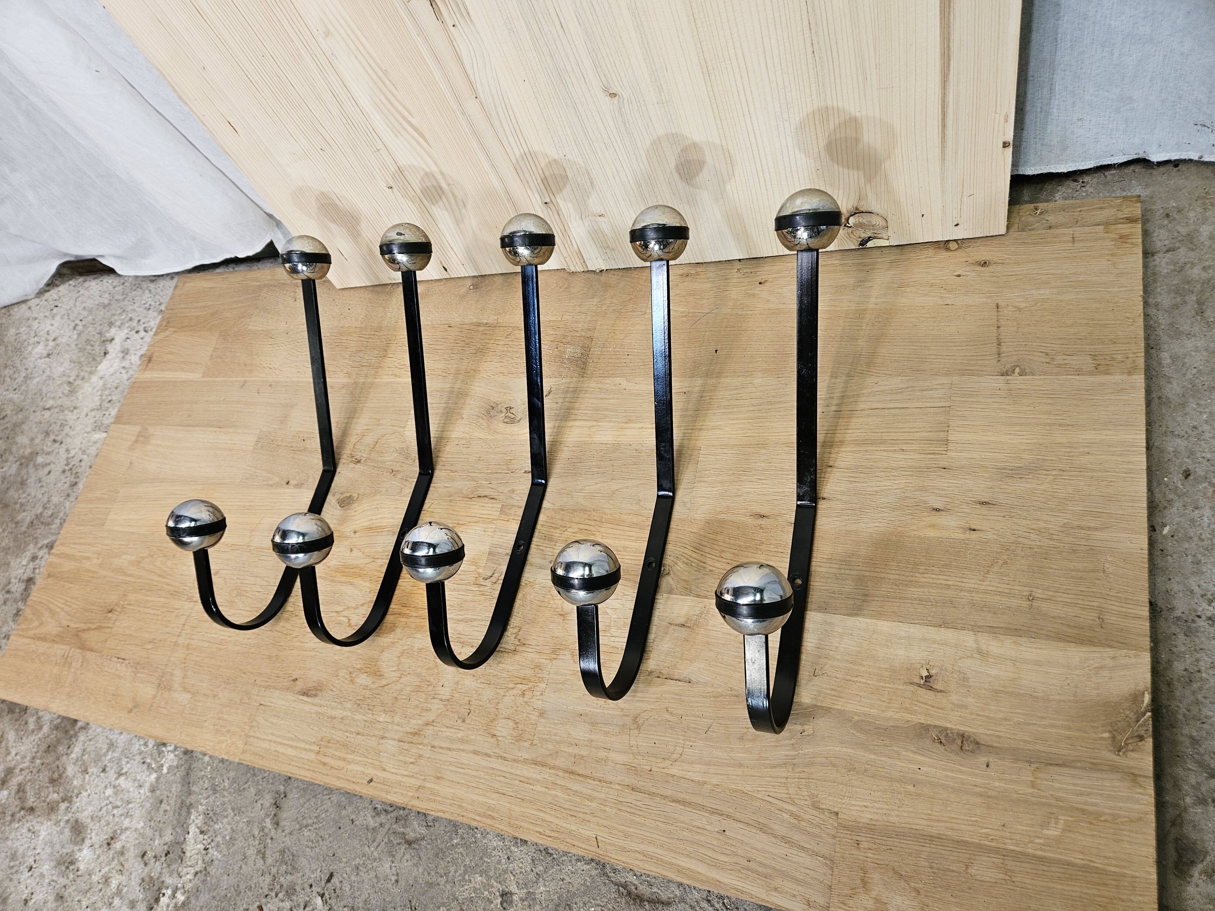 5 black and silver coat hooks from the 60s