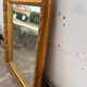 Golden framed mirror