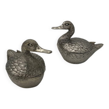 A pair of silver-plated ice buckets featuring a duck by Mauro Manetti.